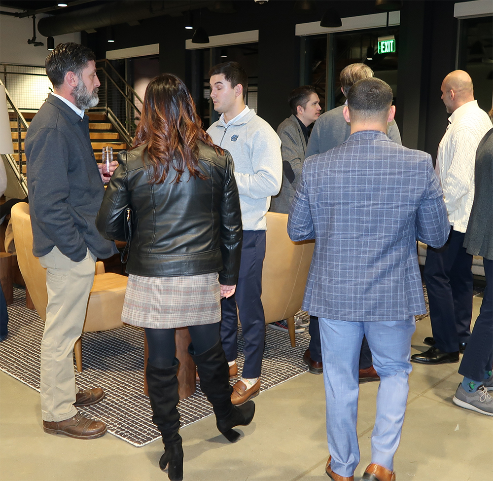 people networking at next mile network event
